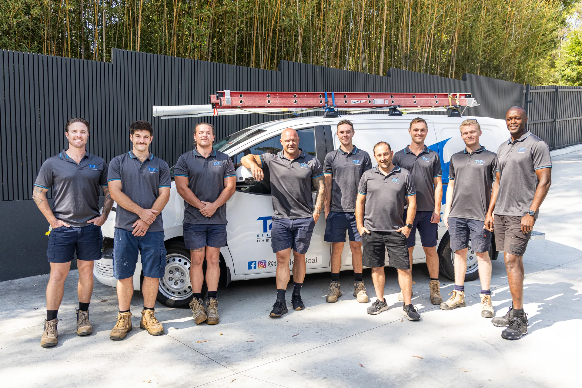 The Air Conditioning Coombabah team with a service van